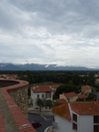 FZ007520 Roofs and clouds over mountain.jpg